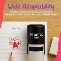 Black self inking teacher stamp placed on lined paper beside a pencil and a red “A+” apple stamp impression on a wooden desk. Text on the image says “Wide Adaptability. Ideal for grading, rewarding, and providing feedback on assignments, tests, and behavi