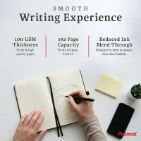 Open personalized leather journal with lined pages as someone writes with a pen, highlighting smooth 100 GSM paper and 192 pages.