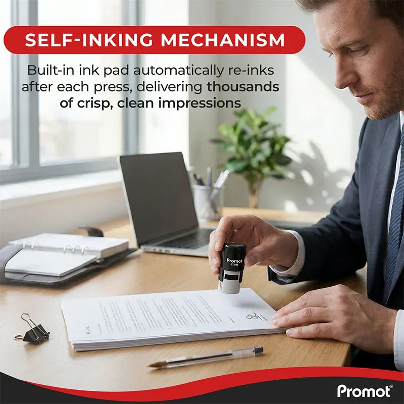 Round signature stamp in use on a document held by a person at an office desk
