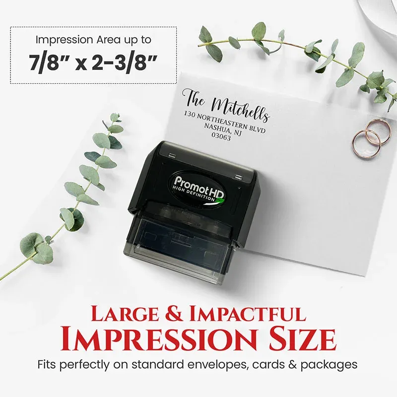Personalized address stamp with stamped envelope showing impression size for mailing and stationery