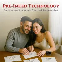Extra large personalized address stamp used by a couple addressing envelopes at a table with pre-inked impressions