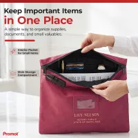 Unzipped notary lock bag showing an interior pocket with pen, cards and watch above notary documents