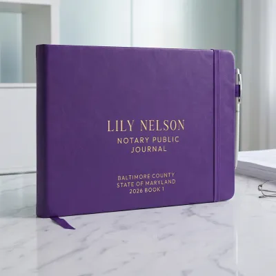 Personalized notary journal in purple vegan leather with custom gold foil name, county, and state on the cover